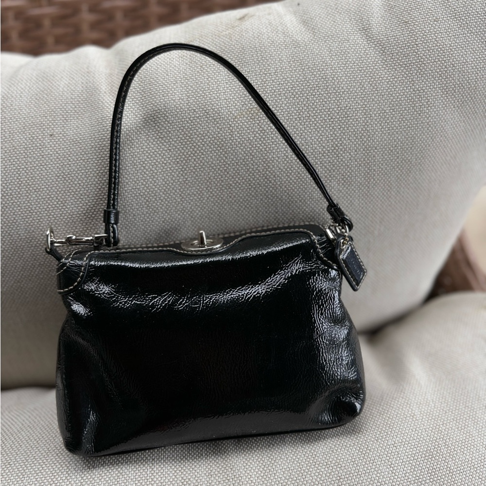 Coach glossy clutch